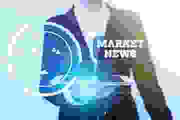 Market news concept with blurred focus on suited man in background