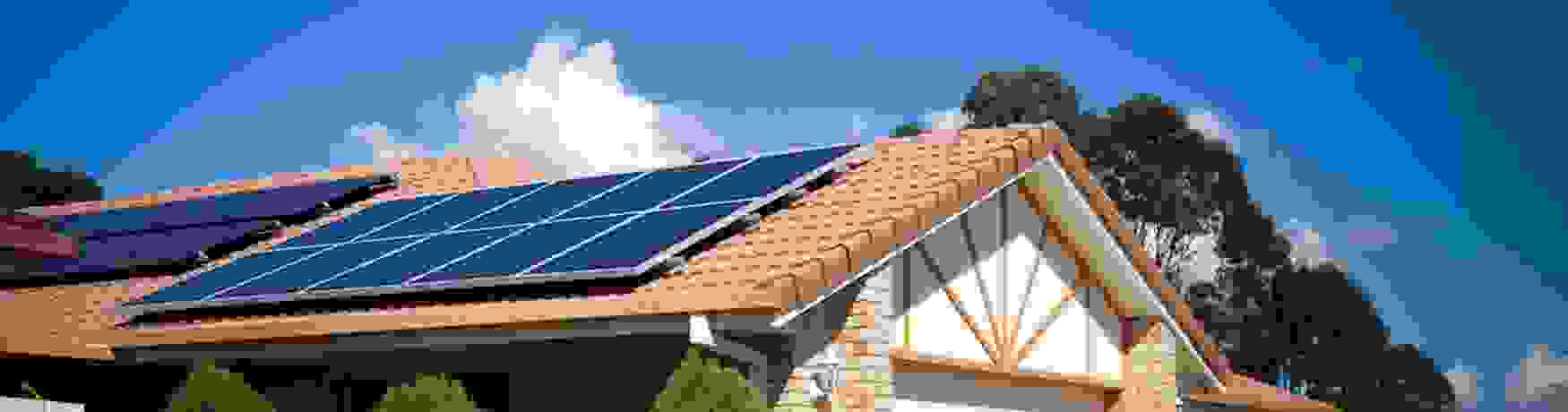 Solar panels on the roof of a suburban home