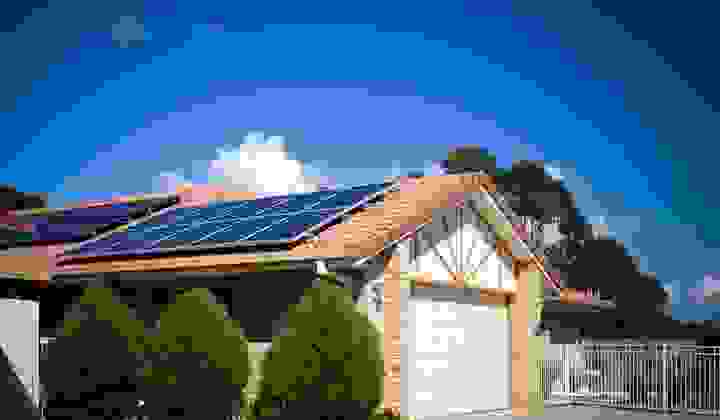 Solar panels on the roof of a suburban home