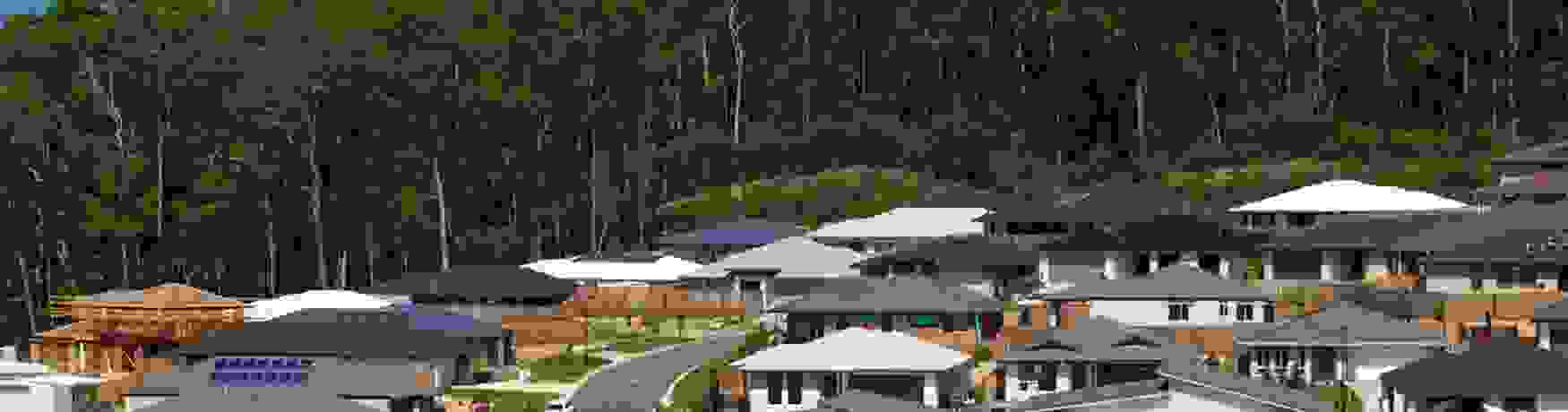 Suburban housing development on the edge of bushland