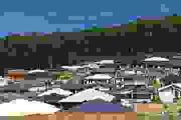 Suburban housing development on the edge of bushland