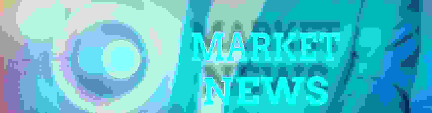 Market news concept with man holding a tablet
